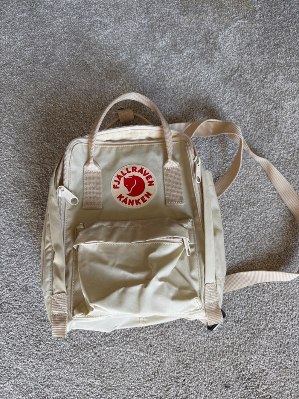 Fjallraven Kanken Mini Backpack in Beige with Red Logo